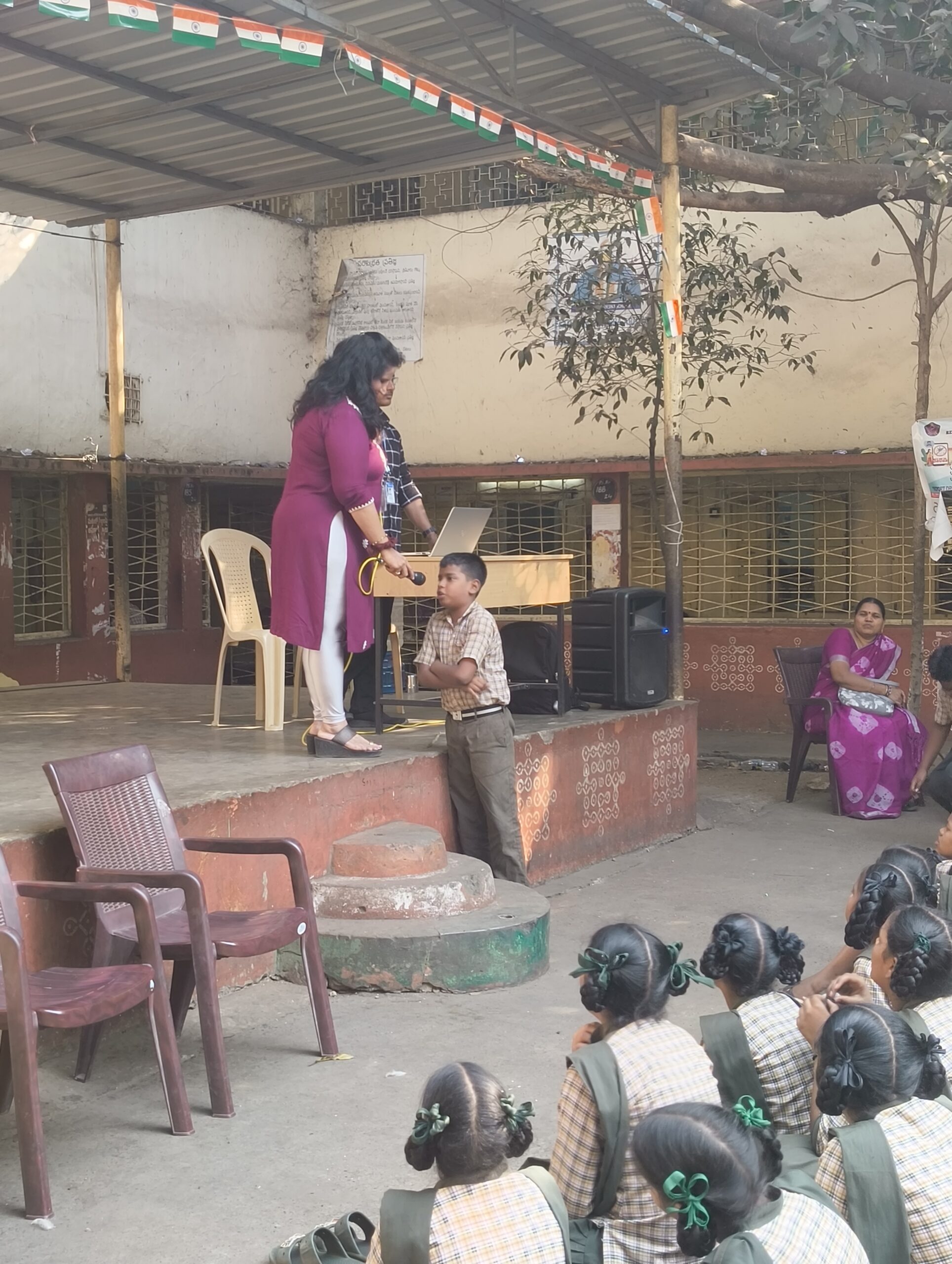 Mrs. Seema Sikri addressing students at GVMC RP Peta High School